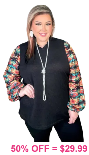 Black waffle knit top with printed bubble sleeves