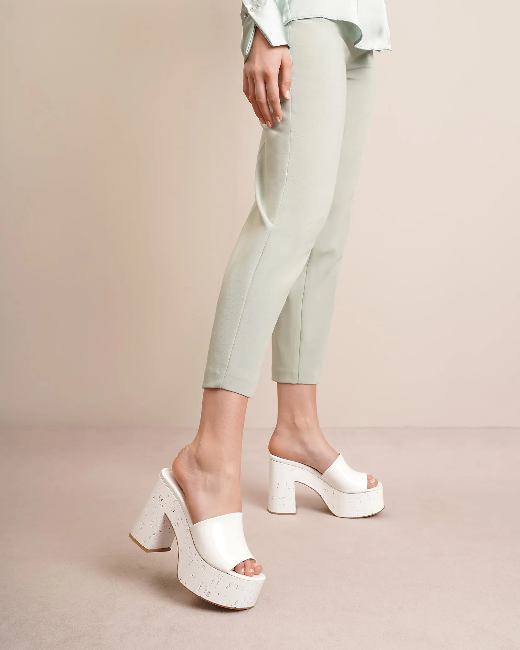 Lacquer Doll white patent platform mules